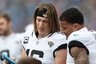 Trevor Lawrence #16 of the Jacksonville Jaguars reviews a play (image credit: Getty)